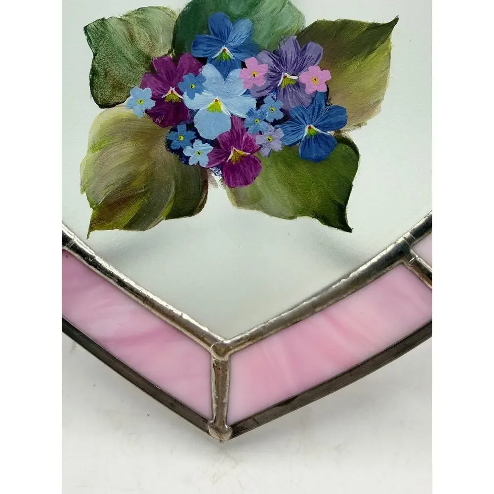 Stained glass heart. With a hand painted floral design.